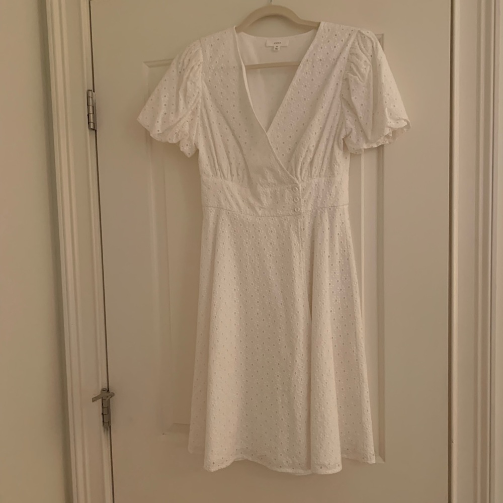 a loves a White eyelet wrap dress